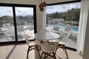 Precioso apartamento en una villa con piscina en Cumbre del Sol Moraira Benitachell